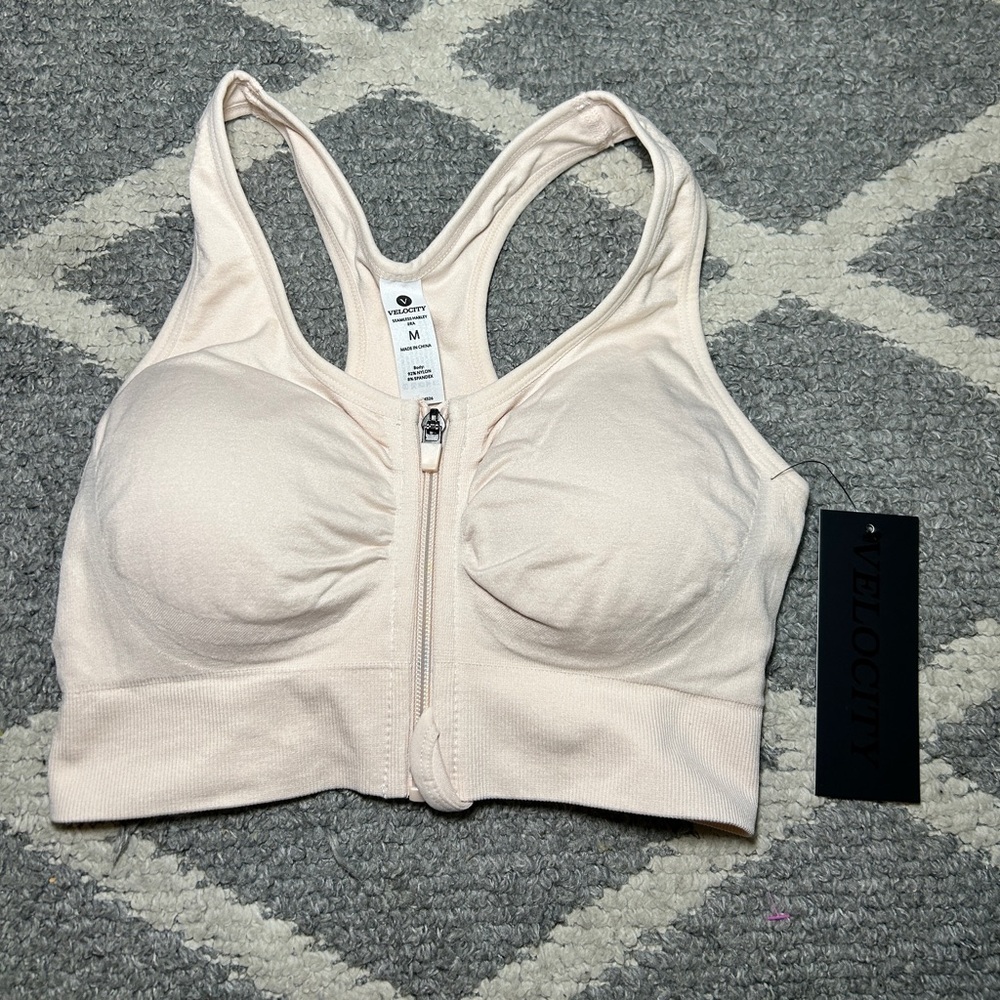Velocity Light Pink Front-Zip Sports Bra